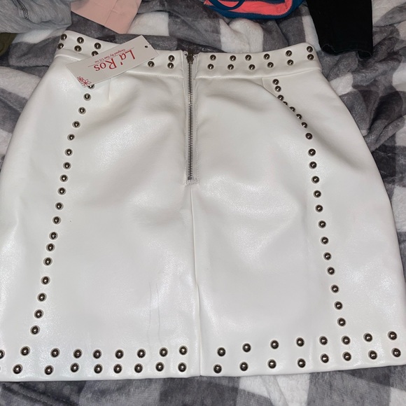 Leather mini skirt. Bought from RiffRaff in Fayetteville, Arkansas. Never worn. - Picture 2 of 3